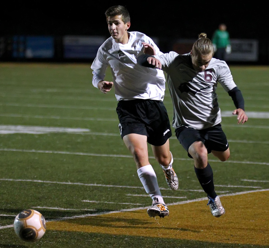 Desert Hills' Christian Cottle and Pine View's Kennedy Taylor (6) battle for the ball, Pine View vs. Desert Hills, Boys Soccer, St. George, Utah, Mar. 3, 2015 | Photo by Robert Hoppie, ASPpix.com, St. George News