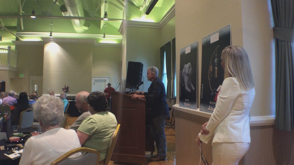 Dimitry Domani, a Romanian artist now residing in Denver, addresses the artists reception for the 2015 opening of Art Around the Corner, St. George Children's Museum, St. George, Utah, March 27, 2015 | Photo by Holly Coombs, St. George News