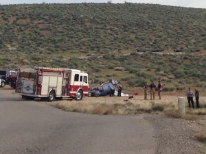 Emergency responders investigate a rollover on Landfill Road, Washington City, Utah, March 22, 2015 | Photo by Holly Coombs, St. George News