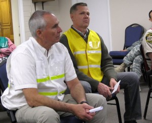 County Emergency Services Director Peter Kuhlmann and Logistics Security Chief Perry Lambert debrief their teams following a mock emergency drill, St. George, Utah, March 4, 2015. | Photo by Ric Wayman, St. George News