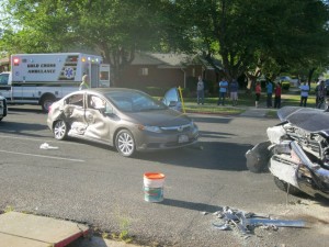 Two children are taken to the hospital after an accident on Main Street, St. George, Utah, April 11, 2015 | Photo by Ric Wayman, St. George News