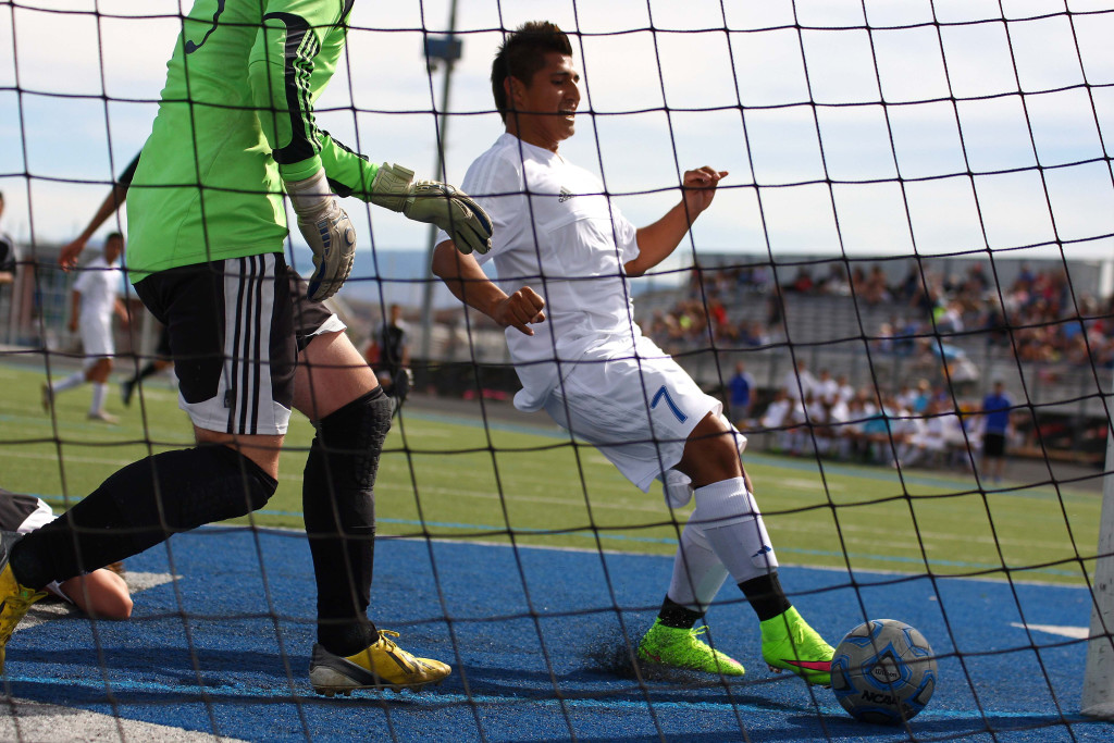 Dixie's Francisco Guzman (7) taps in an easy rebound for a goal in the first half, Dixie vs. Union, Soccer, St. George, Utah, Apr. 30, 2015 | Photo by Robert Hoppie, ASPpix.com, St. George News