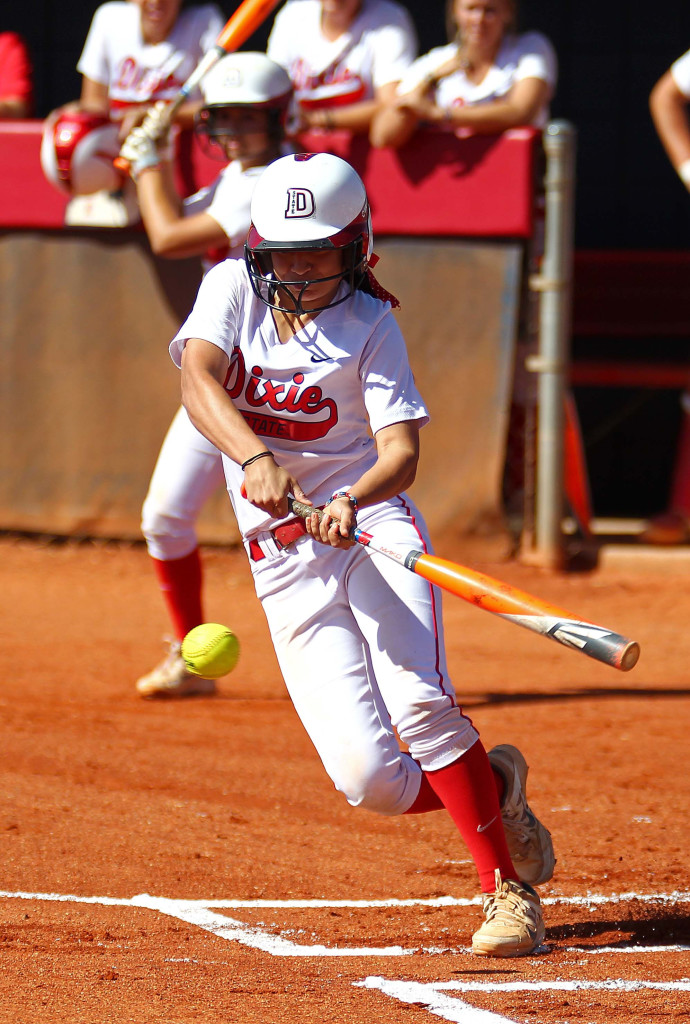 Janessa Bassett slaps at a pitch for Dixie State, Dixie State University vs. Notre Dame de Namur University, Softball, St. George, Utah, Apr. 11, 2015 | Photo by Robert Hoppie, ASPpix.com, St. George News