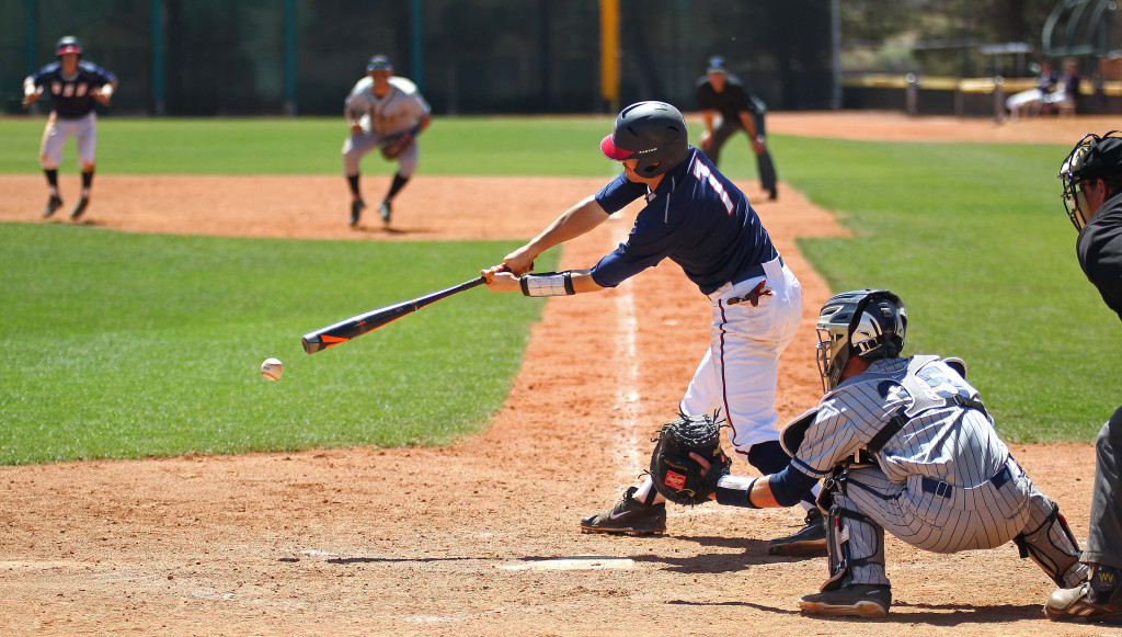 File photo as Tanner Morache (7) takes a swing for Dixie State, vs. California Baptist, St. George, Utah, Apr. 11, 2015 | Photo by Robert Hoppie, ASPpix.com, St. George News