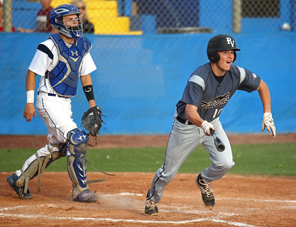 Hunter Hansen for Pine View watches the flight of his fly ball, Pine View vs. Dixie, Baseball, St. George, Utah, Apr. 14, 2015 | Photo by Robert Hoppie, ASPpix.com, St. George News