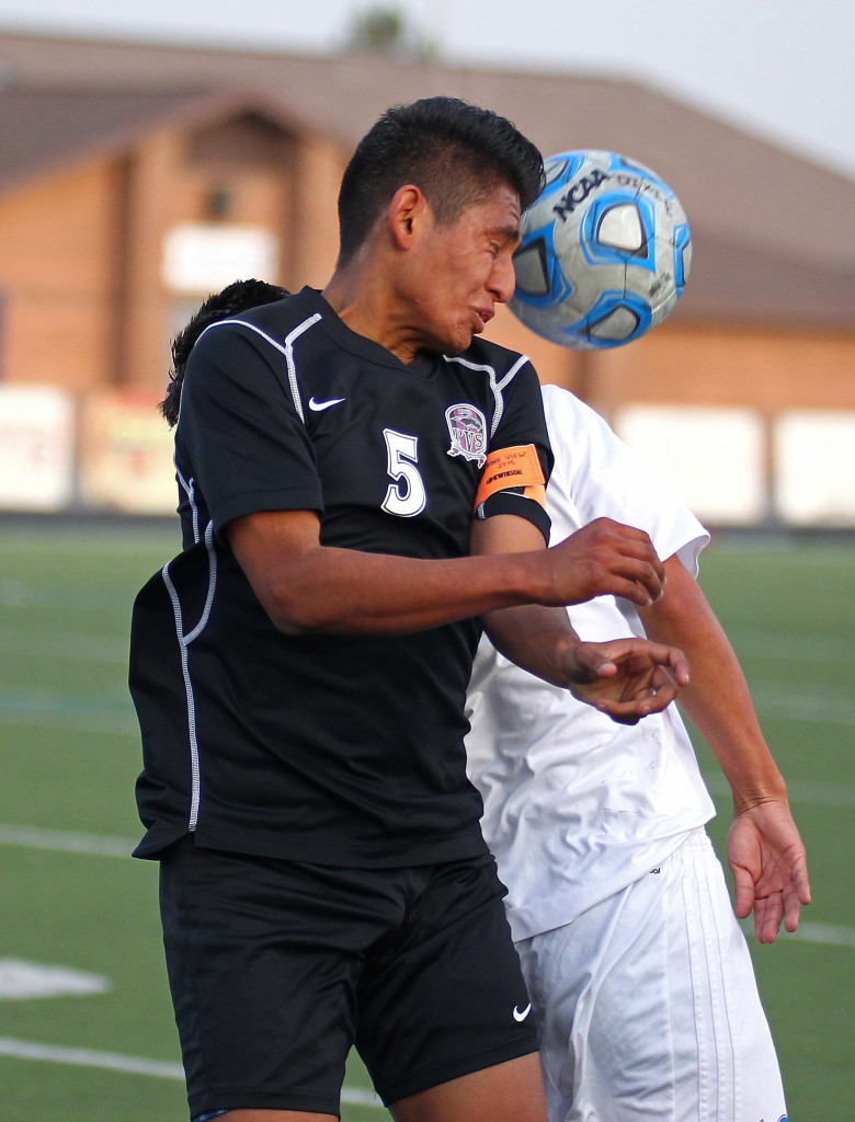 Federico Resendis (5) with a header for Pine View, Pine View vs. Dixie, Soccer, St. George, Utah, Apr. 14, 2015 | Photo by Robert Hoppie, ASPpix.com, St. George News