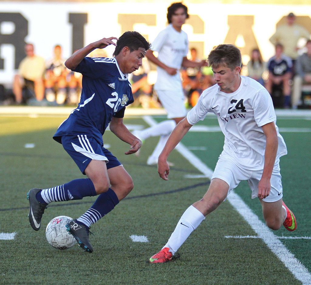 Kevin Guevara Chillin (20) and Easton Householder (24), Snow Canyon vs. Pine View, Soccer, St. George, Utah, Apr. 17, 2015 | Photo by Robert Hoppie, ASPpix.com, St. George News