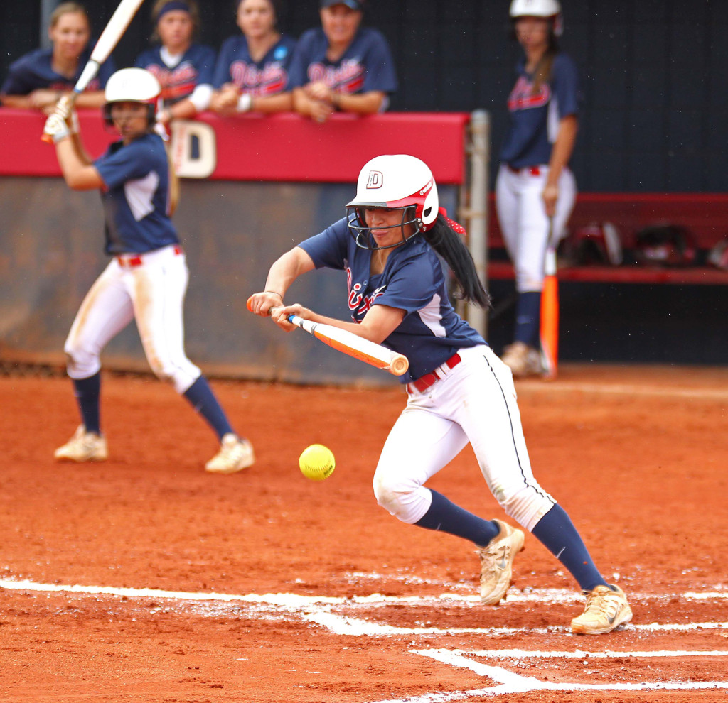 Dixie State's Janessa Bassett slaps for a hit, Dixie State University vs. Azusa Pacific University, Softball, St. George, Utah, Apr. 25, 2015 | Photo by Robert Hoppie, ASPpix.com, St. George News