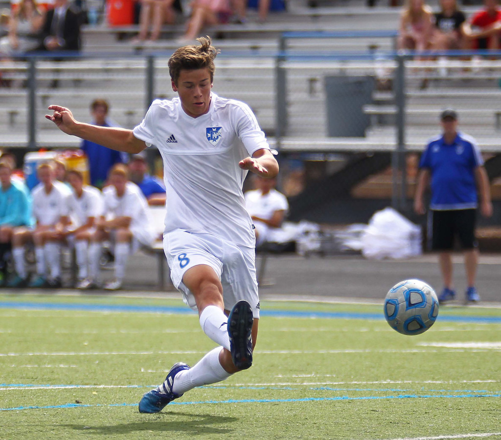 Tyler Bennett (8) fires a shot for the Flyers, Dixie vs. Union, Soccer, St. George, Utah, Apr. 30, 2015 | Photo by Robert Hoppie, ASPpix.com, St. George News