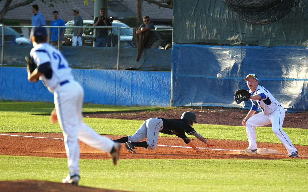 Drew Bailey throws to jaxon Davis to pick off a runner,  Desert Hills vs. Dixie, Baseball, St. George, Utah, Mar. 31, 2015 | Photo by Robert Hoppie, ASPpix.com, St. George News