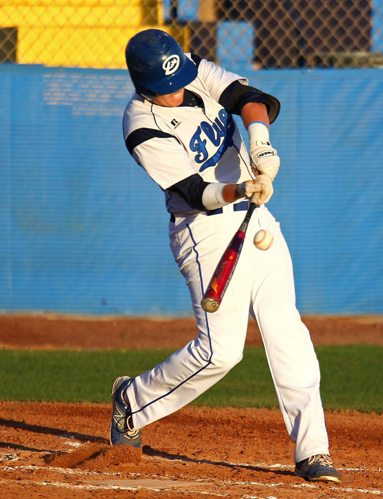 Jaden Rawlings rips a pitch to the wall in center field for the Flyers, Desert Hills vs. Dixie, Baseball, St. George, Utah, Mar. 31, 2015 | Photo by Robert Hoppie, ASPpix.com, St. George News