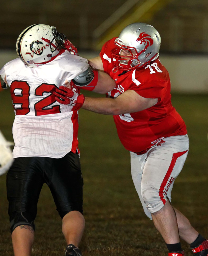 Lion's offensive lineman Logan Stott (78) on pass protection, Zion Lions vs. Davis Vipers, Football, St. George, Utah, Apr. 4, 2015 | Photo by Robert Hoppie, ASPpix.com, St. George News