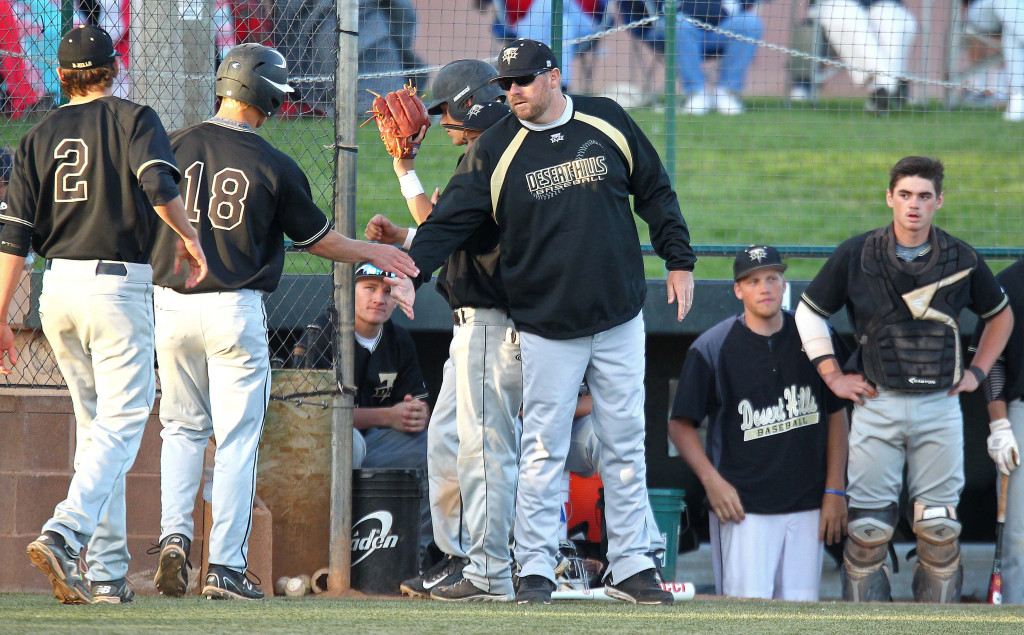 Thunder head Coach Jerry Beck congratulates Chad Nelson (18) after scoring the first run of the game, Desert Hills vs. Snow Canyon, Baseball, St. George, Utah, Apr. 7, 2015 | Photo by Robert Hoppie, ASPpix.com, St. George News