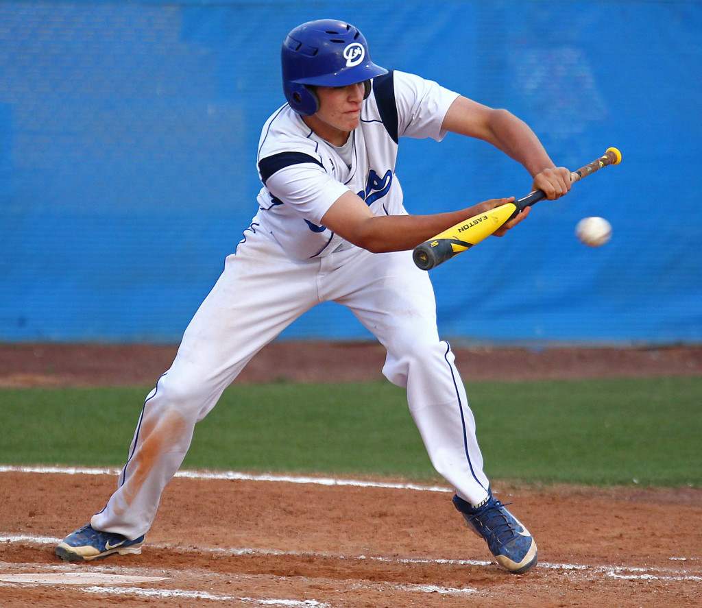 Tyson Fisher lays down a sacrifice bunt for Dixie, file photo from Cedar vs. Dixie, Baseball, St. George, Utah, Apr. 10, 2015 | Photo by Robert Hoppie, ASPpix.com, St. George News