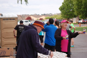 Volunteers hand out fuel and beverages during the Southern Utah Half Marathon, St. George, Utah, April 25, 2015 | Photo by Hollie Reina, St. George News