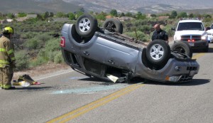 One person receives mild injuries in an SUV rollover on Pioneer Parkway, Santa Clara, Utah, April 3, 2015  | Photo by Ric Wayman, St. George News