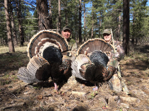 Two hunters holding their tom turkeys, location unspecified, April 11, 2015 | Photo courtesy of Utah Wildlife Resources, St. George News