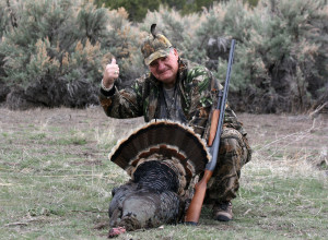 Hunter holding their tom turkeys, location unspecified, November 19, 2013 | Photo courtesy of Utah Wildlife Resources, St. George News
