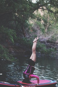 Head stand on the paddle board at Quail Creek Reservoir, April 29, 2015 | Photo by Corey McNeil, St. George News 