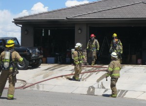 An afternoon fire damaged a garage in the 1900 block of South 2620 E. Circle but caused no injuries, St. George, Utah, May 25, 2015 | Photo by Ric Wayman, St. George News