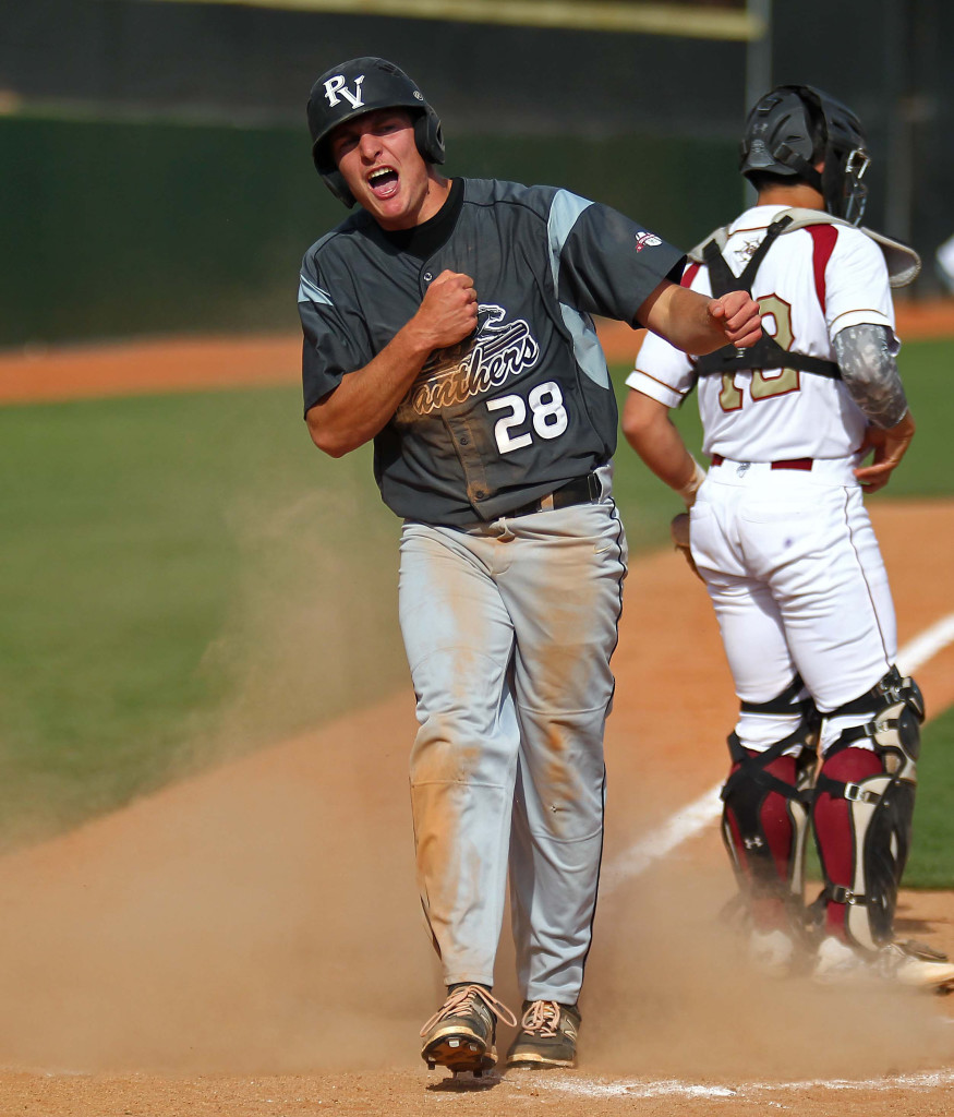 Blake Ence (28) reacts after scoring a run for the Panthers, Pine View vs. Cedar, Baseball, St. George, Utah, May 15, 2015 | Photo by Robert Hoppie, ASPpix.com, St. George News