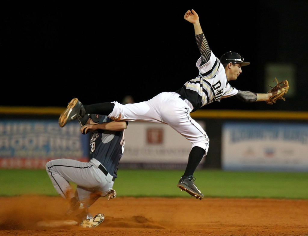 Thunder shortstop Braiden Irvin saves a throw from going in to the outfield on a steal attempt by Pine View's Hunter Hansen, Pine View vs. Desert Hills, Baseball, St. George, Utah, May 1, 2015 | Photo by Robert Hoppie, ASPpix.com, St. George News