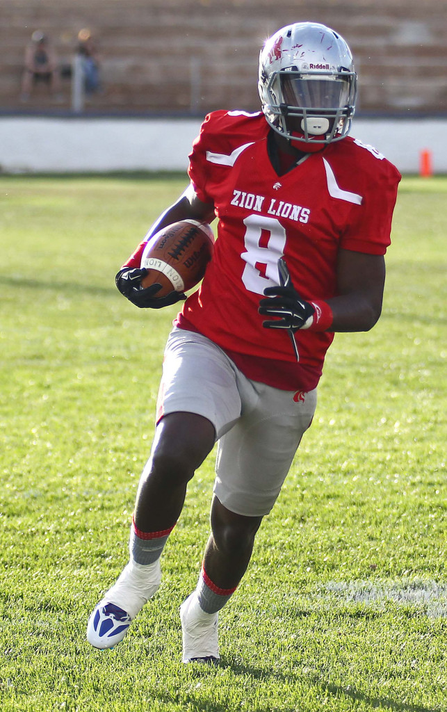 Josh Ford (8) will take over at quarterback for the Lions. File photo from Logan Stampede vs. Zion Lions, Football, St. George, Utah, May 2, 2015 | Photo by Robert Hoppie, ASPpix.com, St. George News