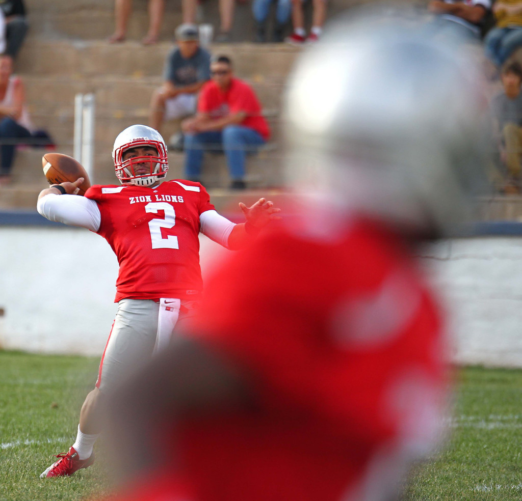 Zion quarterback Misi Tupe (2) throws a fade to Chad Ford, Logan Stampede vs. Zion Lions, Football, St. George, Utah, May 2, 2015 | Photo by Robert Hoppie, ASPpix.com, St. George News