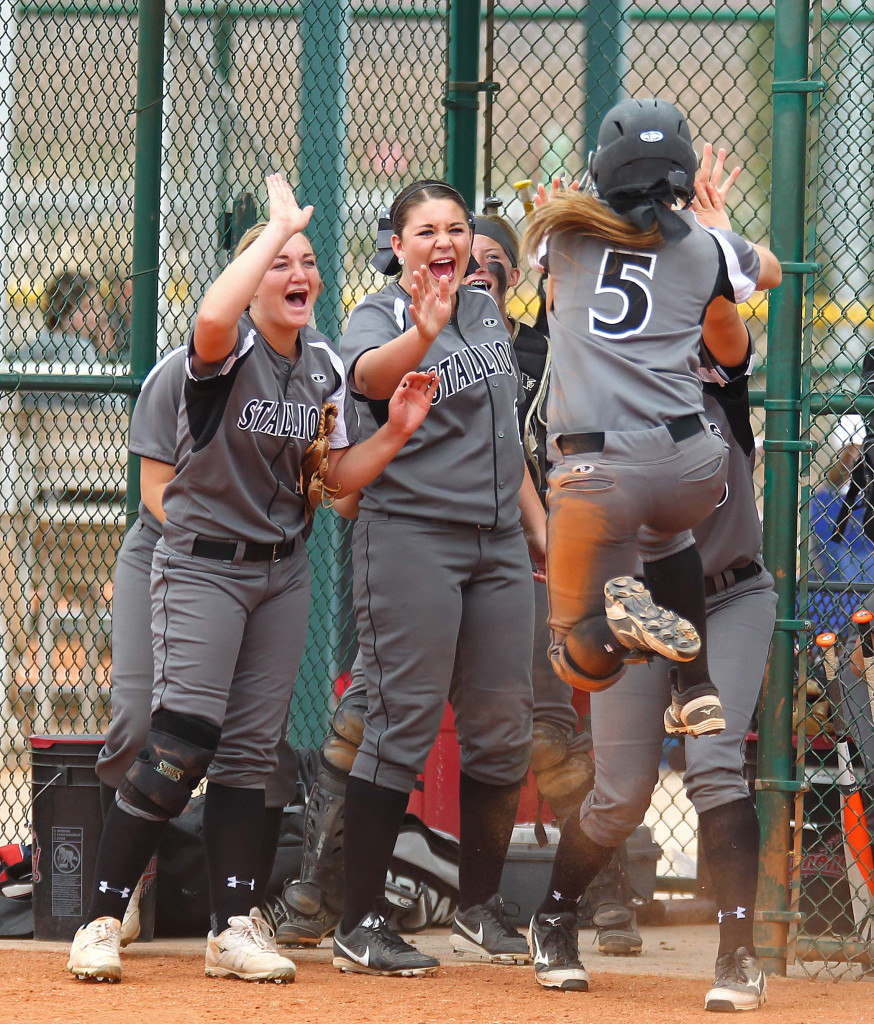 Stansbury celebrates after scoring a run, Snow Canyon vs. Stansbury, Softball, St. George, Utah, May 14, 2015 | Photo by Robert Hoppie, ASPpix.com, St. George News