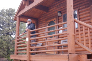 Recreation manager, Jake Millard, pauses to enjoy the view from one of the Cabin Suites at Zion Ponderosa Ranch Resort, Mount Carmel, Utah, May 18, 2015 | Photo by Hollie Reina, St. George News