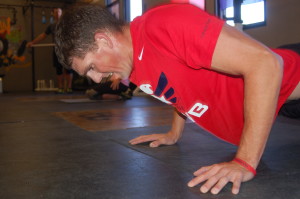 Team Red, White and Blue member and local chapter organizer, Garrett Johnson completes exercises during the "WOD with Warriors" event held at CrossFit St. George, St. George, Utah, May 25, 2015 | Photo by Hollie Reina, St. George News