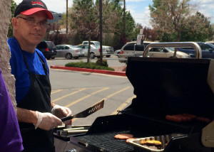 Smith's Food and Drug Employees Scott Simpson barbecues burgers for Primary Children's Hospital, 633 S Main St, Cedar City, Utah, May 2, 2015 | Photo by Carin Miller, St. George News