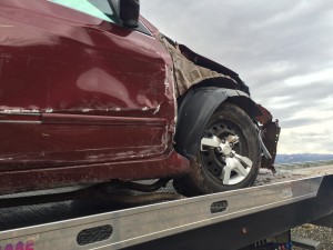 Car hydroplanes and spins on Interstate 15, Milepost 39, New Harmony, Utah, May 14, 2015 | Photo by Carin Miller, St. George News 