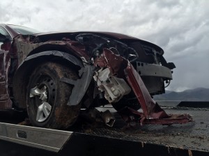 Car hydroplanes and spins on Interstate 15, Milepost 39, New Harmony, Utah, May 14, 2015 | Photo by Carin Miller, St. George News 