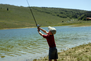 Young boy casting his line while fishing, location unspecified, July 4, 2007 | Photo courtesy of Division of Wildlife Resources, St. George News