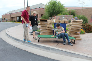 Jackson Ouzts tries out one of the cots he donated to the Washington City Community Center, Washington, Utah, May 20, 2015 | Photo by Nataly Burdick, St. George News