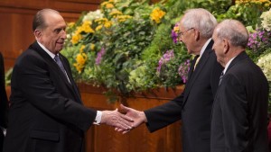 President Thomas S. Monson shakes the hand of Elder L. Tom Perry following the end of a session of general conference, Salt Lake City, Utah, April 2013 | Photo courtesy of The Church of Jesus Christ of Latter-day Saints, St. George News