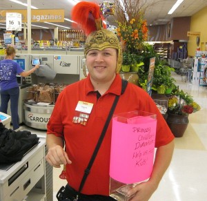 Travis Groomes helps raise money for Primary Children's Medical Center at the checkout line at Smith's Market, St. George, Utah, May 16, 2015 | Photo by Ric Wayman, St. George News