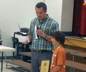 XXX from AAA presents Tyler Sunyich with h is award for AAA safety patroller Friday May 1, 2015 | Photo by Ric Wayman, St. George News