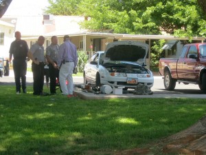 A car slipped off a jack, pinning and injuring a woman, Washington, Utah,  June 3, 2015 | Photo by Ric Wayman, St. George News