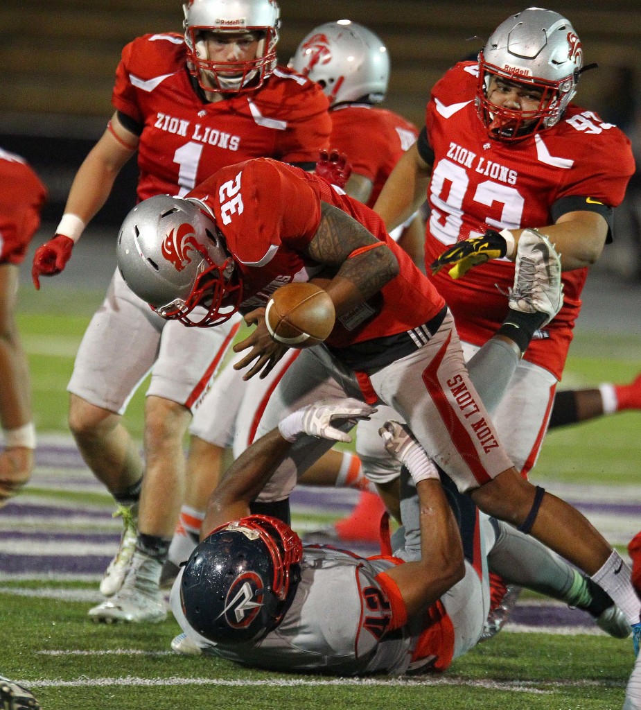 Lei Angilau (32) fumbles a kickoff return, Zion Lions vs. Wasatch Revolution, Ogden, Utah, June 27 2015, | Photo by Robert Hoppie, ASPpix.com, St. George News