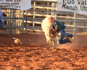 Young cowboy wrangles an animal during the "Jacob Hamblin Days Ranch Rodeo", Kanab, Utah, undated | Photo courtesy of Kane County Office of Tourism, St. George News