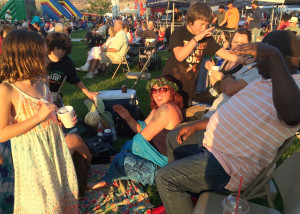 Lounging at the park enjoying the music at the Groovefest Music and Art Festival, Main Street Park, Cedar City, Utah, June 27, 2015 | Photo by Carin Miller, St. George News