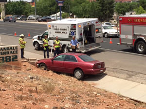 A drowsy driver crashed into a concrete barrier on Bluff Street, sending her to the hospital, St. George, Utah, June 23, 2015 | Photo courtesy of Tyler Truman, St. George News