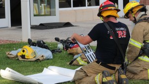 Firefighters in front of the LDS Institute at Dixie State University. They had alerted of a possible fire that ultimately turned out to be a false alarm, St. George, Utah, June 26, 2015 | Photo by Mori Kessler, St. George News