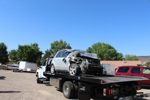 Damage to a Suzuki SX4 after it crashed into a brick wall and house, St. George, Utah, June 2, 2015 | Photo by Nataly Burdick, St. George News