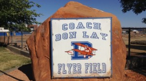 A large rock bearing the name of Coach Don Lay Flyer Field sits just outside the fence of where the field, now torn down, used to exist, St. George, Utah, June 16, 2015 | Photo by Hollie Reina, St. George News