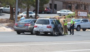 A two-car accident on Bluff Street caused by one car running a red light, St. George, Utah, July 9, 2015 | Photo by Ric Wayman, St. George News