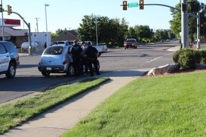 Cedar City Police officers respond to a vehicle-versus-bicycle accident on 200 North in Cedar City, Utah, July 28, 2015 | Photo by Carin Miller, St. George News