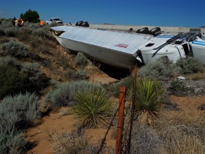 A semitruck lies on its side straddling a culvert near the Toquerville Exit on Interstate 15 northbound, Toquerville, Utah, July 22, 2015 | Photo by Julie Applegate, St. George News